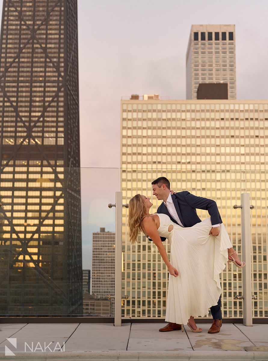 engagement photos chicago sunset rooftop dip