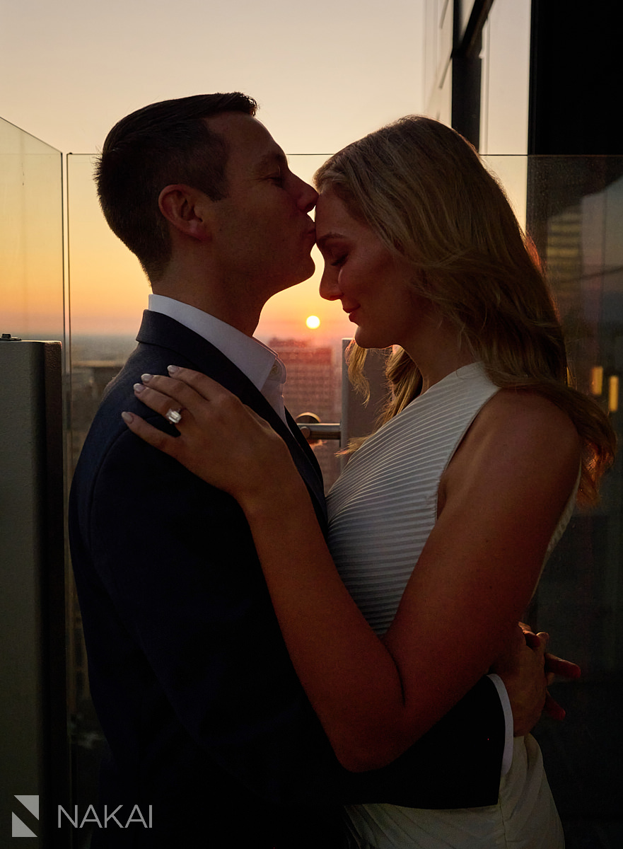 engagement photos chicago sunset rooftop forehead kiss