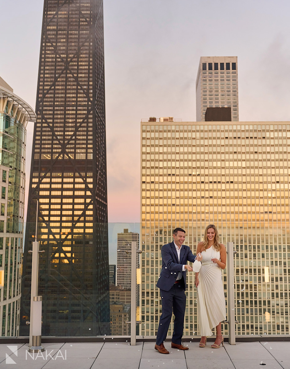 engagement photos chicago sunset champange rooftop