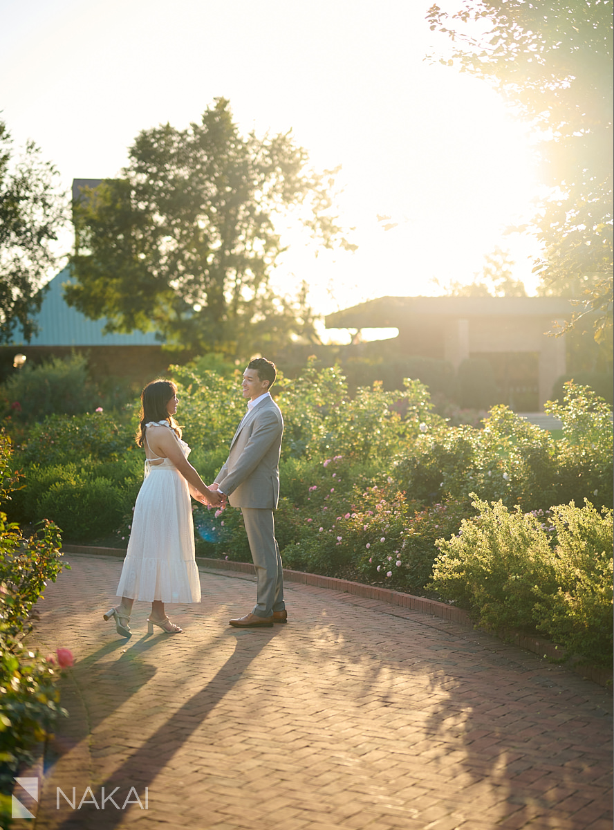 chicago botanic garden engagement photos couple walking