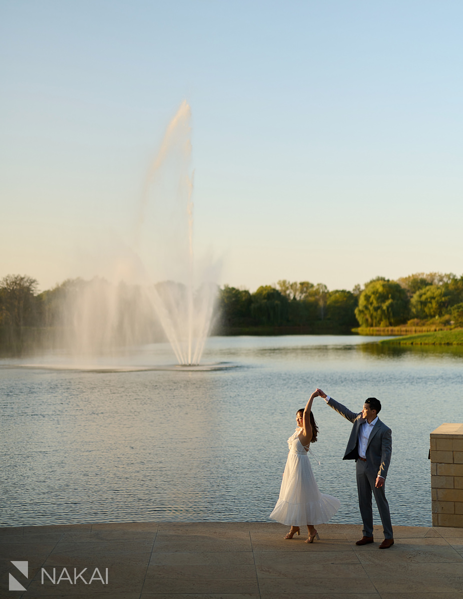 chicago botanic garden engagement photos fountain couple dancing